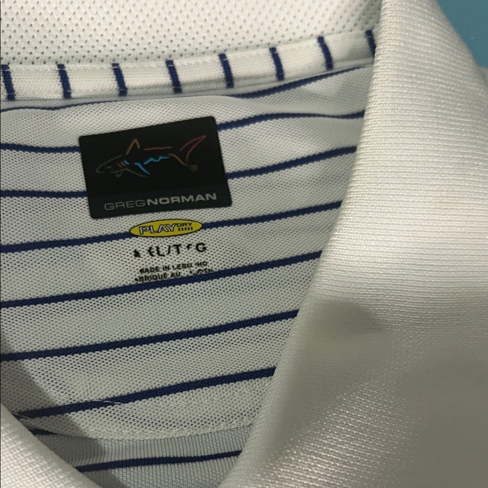 Greg Norman Collection Men's Polo in White with Navy Stripes